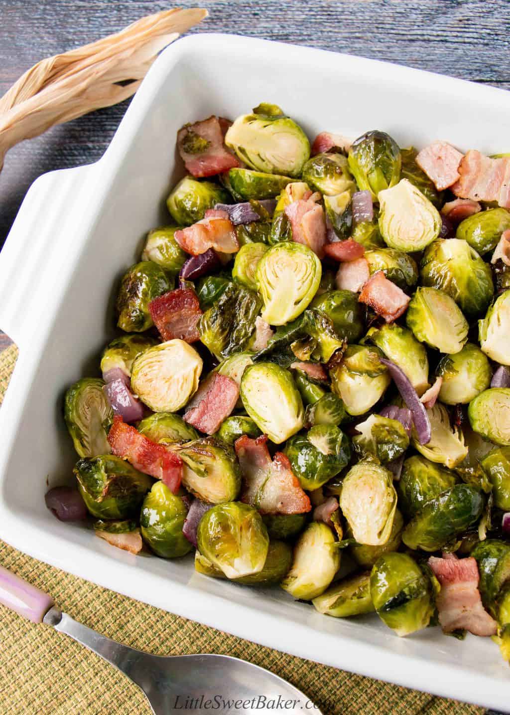 This easy one-pan roasted brussel sprouts is a perfect side dish to any meal. The bacon adds a smokey flavor to the crispy and sweet caramelized brussel sprouts. #roastedbrusselsprouts #Thanksgivingside #Thanksgivingrecipe