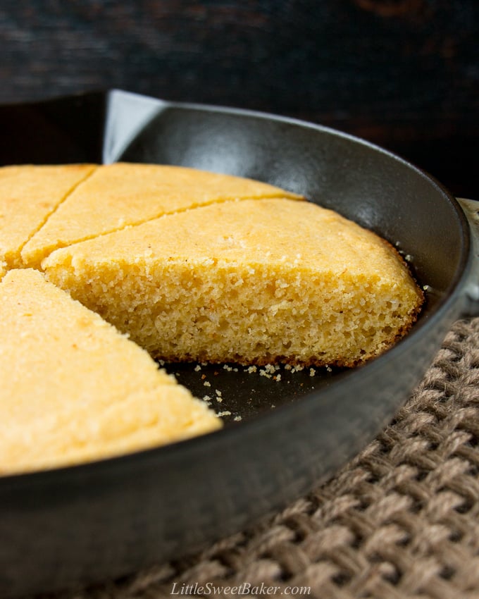 This one-bowl recipe for tender and buttery cornbread is baked in a cast iron skillet for a delightfully crispy crust. #cornbreadrecipe #skilletcornbread #buttermilkcornbread #castironcornbread