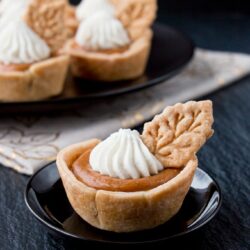These individual mini pumpkin pies are creamy and perfectly flavored with pumpkin and spices. They are super easy to make and even easier to serve. #minipumpkinpie #individualpumpkinpies #Thanksgivingdessert