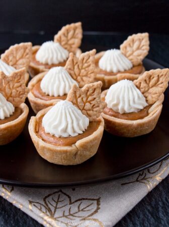 These individual mini pumpkin pies are creamy and perfectly flavored with pumpkin and spices. They are super easy to make and even easier to serve. #minipumpkinpie #individualpumpkinpies #Thanksgivingdessert