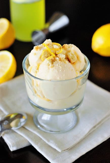 Limoncello lemon ice cream in a glass bowl on a white napkin