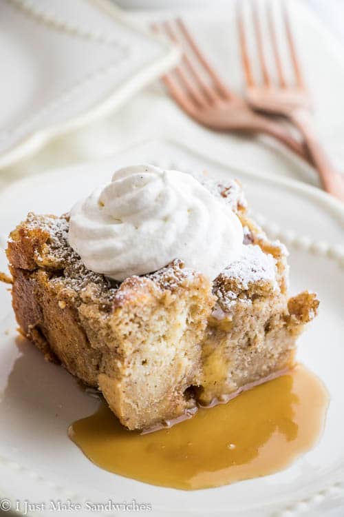 rum raisin bread pudding with toffee sauce and topped with whipped cream