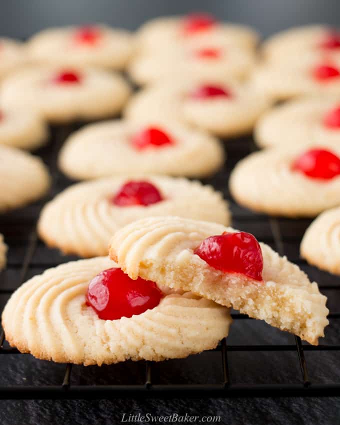 A close up of a butter cookies on a cooling rack.