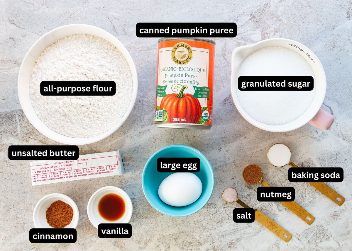 An labelled image of all the ingredients needed to make pumpkin cookies.