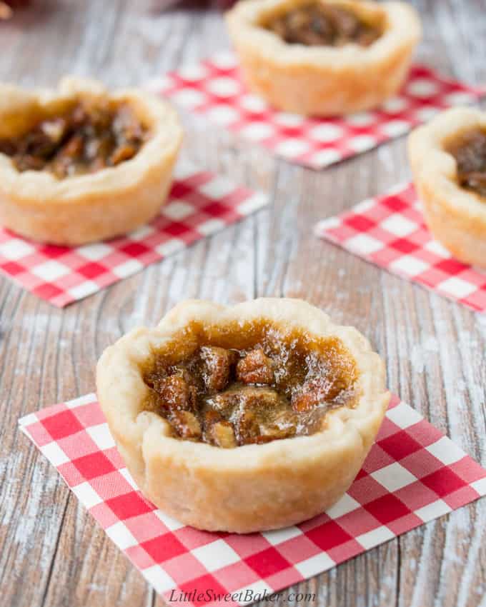 pecan butter tarts on red and white napkins