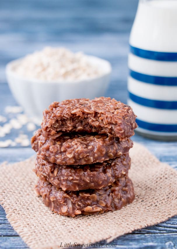 A stack of no-bake cookies with a bite taken out of the top one.