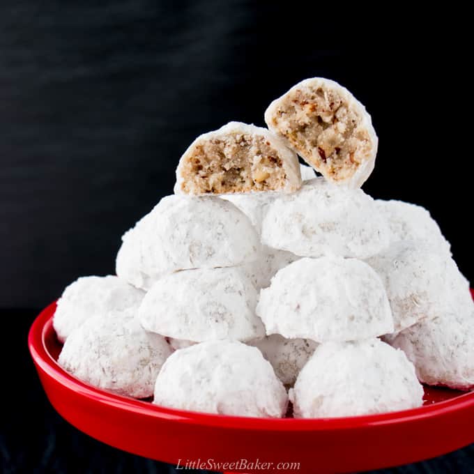 snowball cookies on a red plate