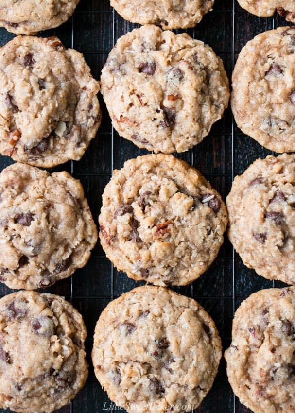 An overhead view of cowboy cookies on a cooling rack.