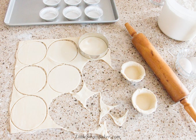 cutting circles out of puff pastry dough