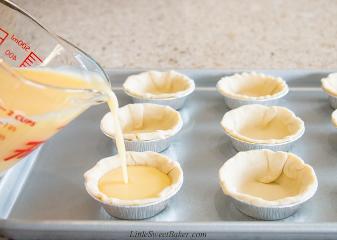 pouring custard into tart shells