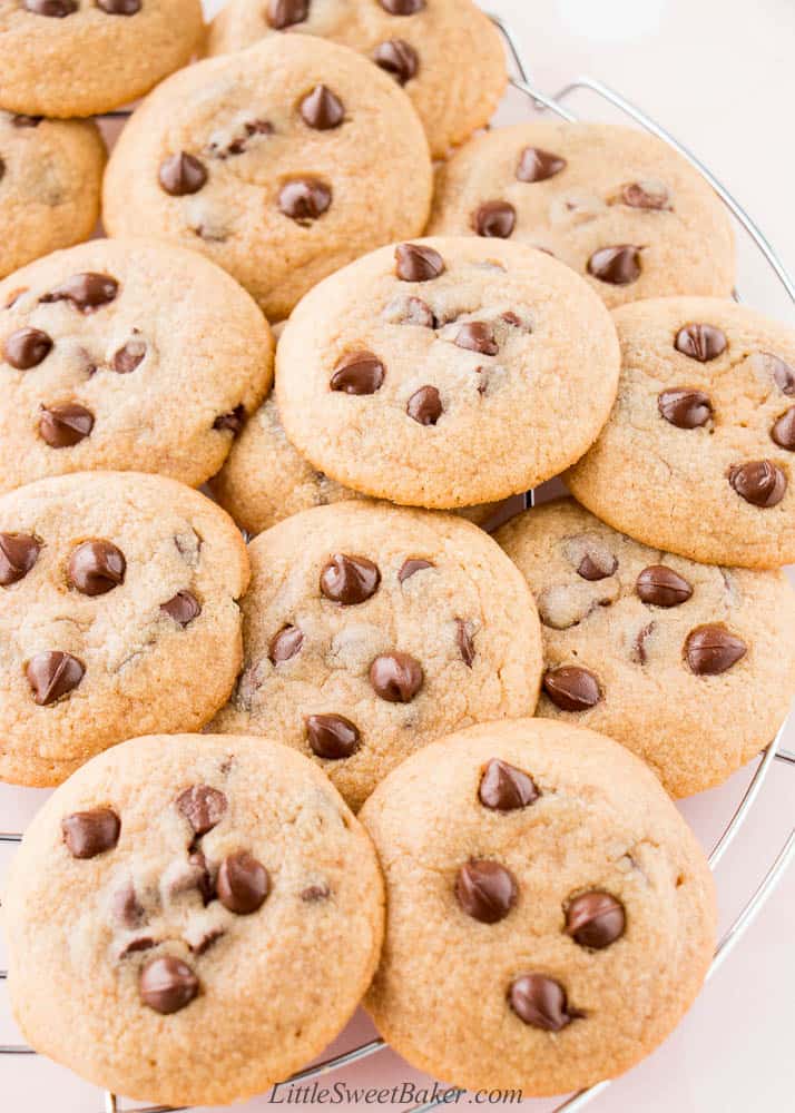 A pile of small-batch chocolate chip cookies on a cooling rack.