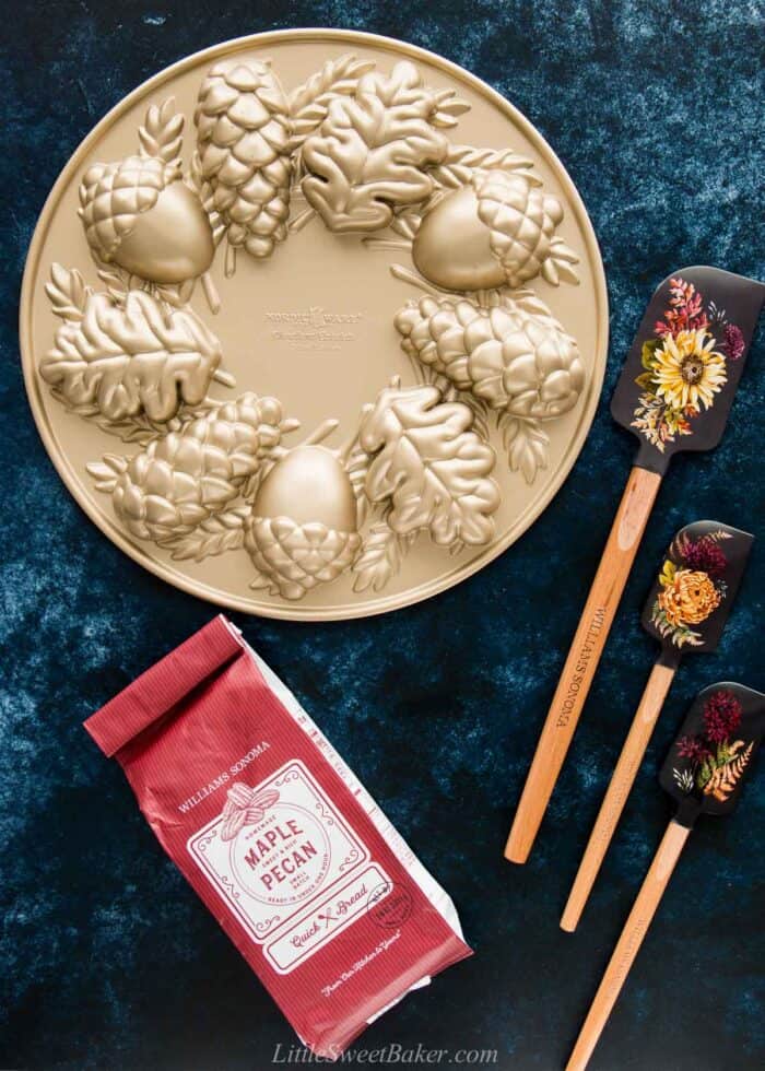 Nordic Ware Woodland Cakelet Pan and Williams Sonoma Maple Pecan quick bread mix and flower spatulas.