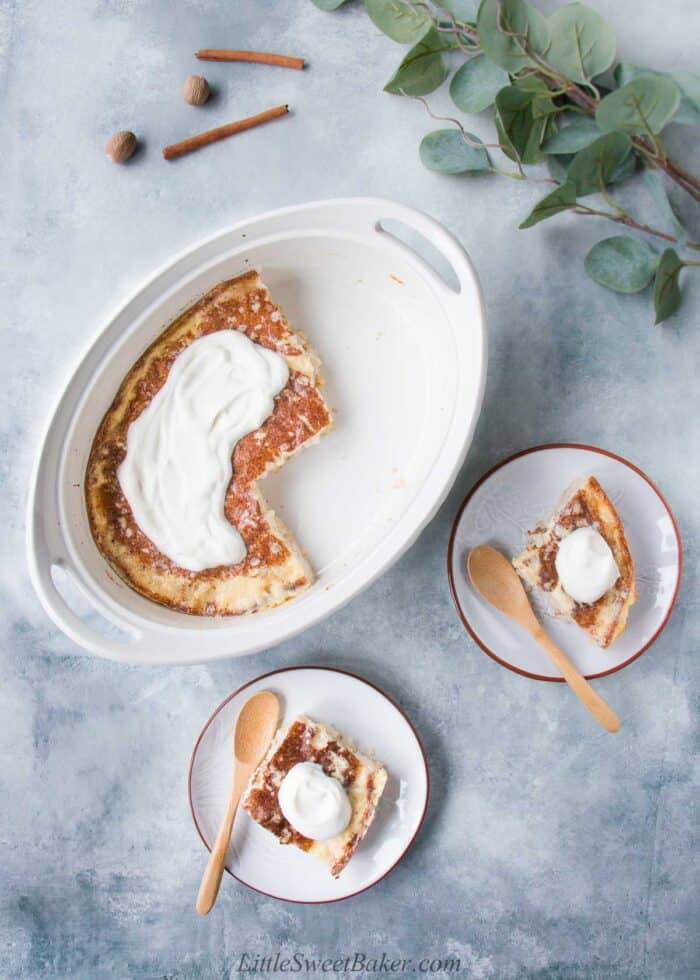 Baked rice pudding in a baking dish and two slices on a plate.