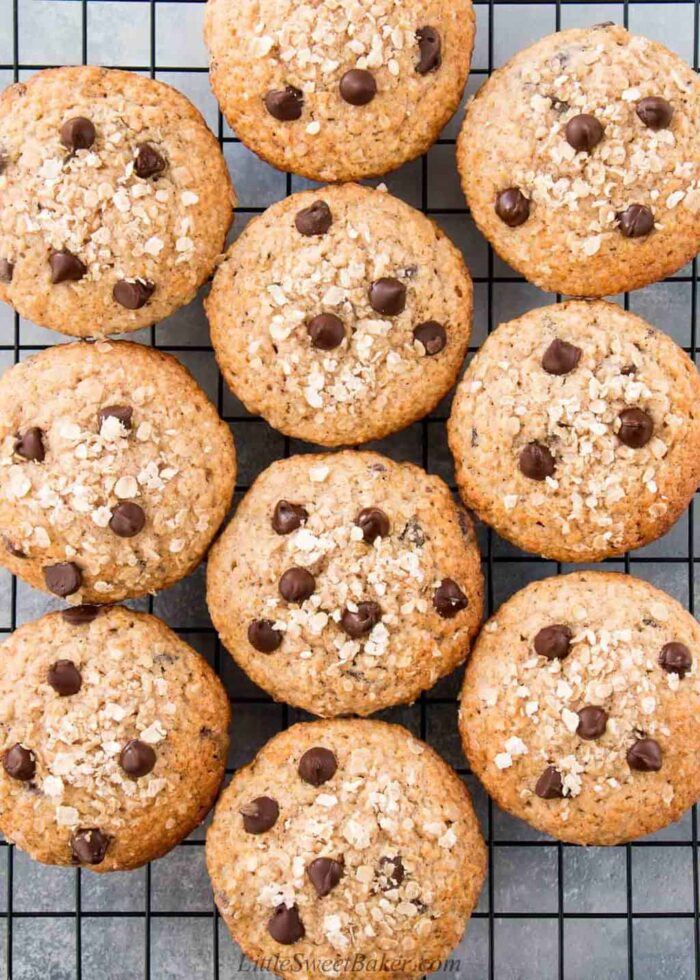 Top down view of oatmeal chocolate chip muffins on a cooling rack.