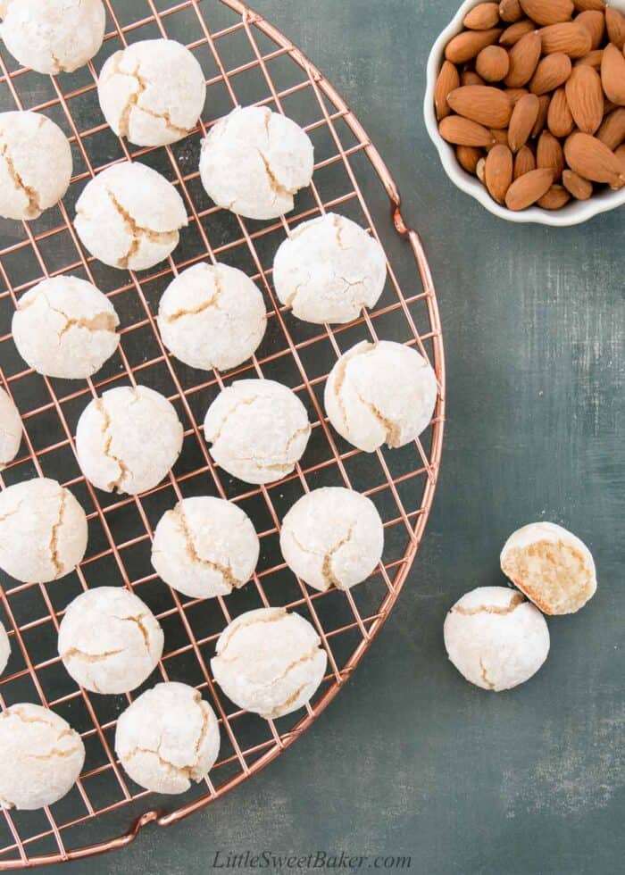 Amaretti cookies on a copper cooling rack.