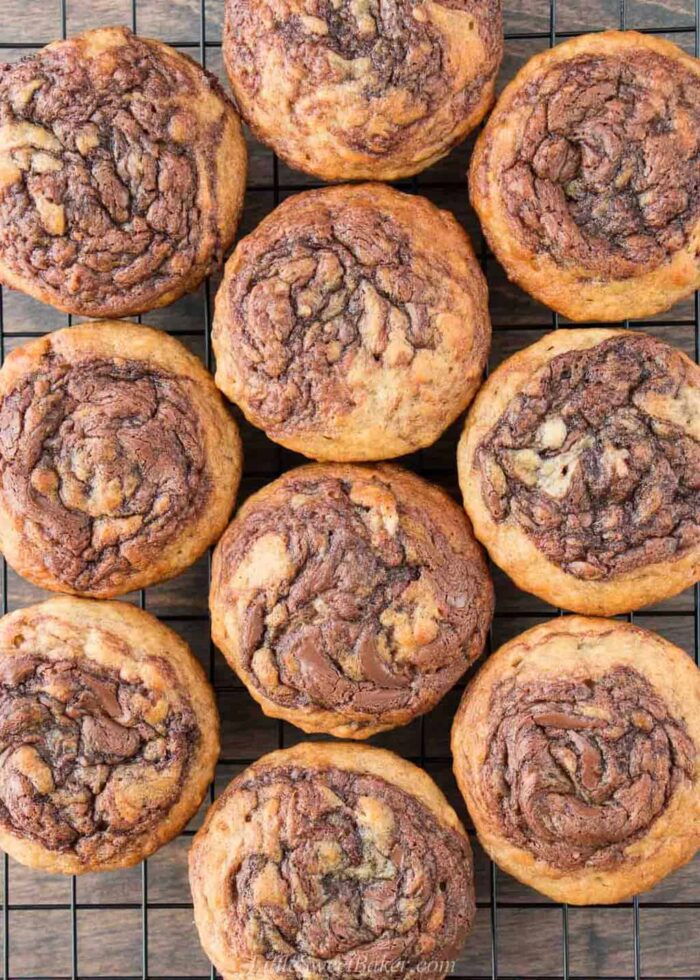Top down view of Nutella banana muffins on a cooling rack.