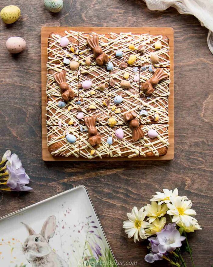 Mini egg blondies on a cutting board.