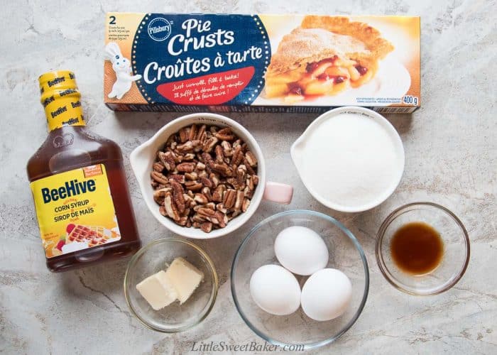 Ingredients to make easy pecan pie using store=bought pie crust.