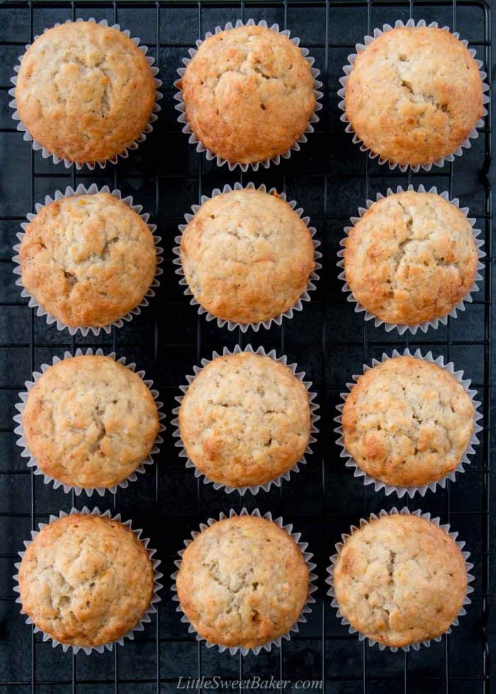 Overhead view of banana muffins on a cooling rack.