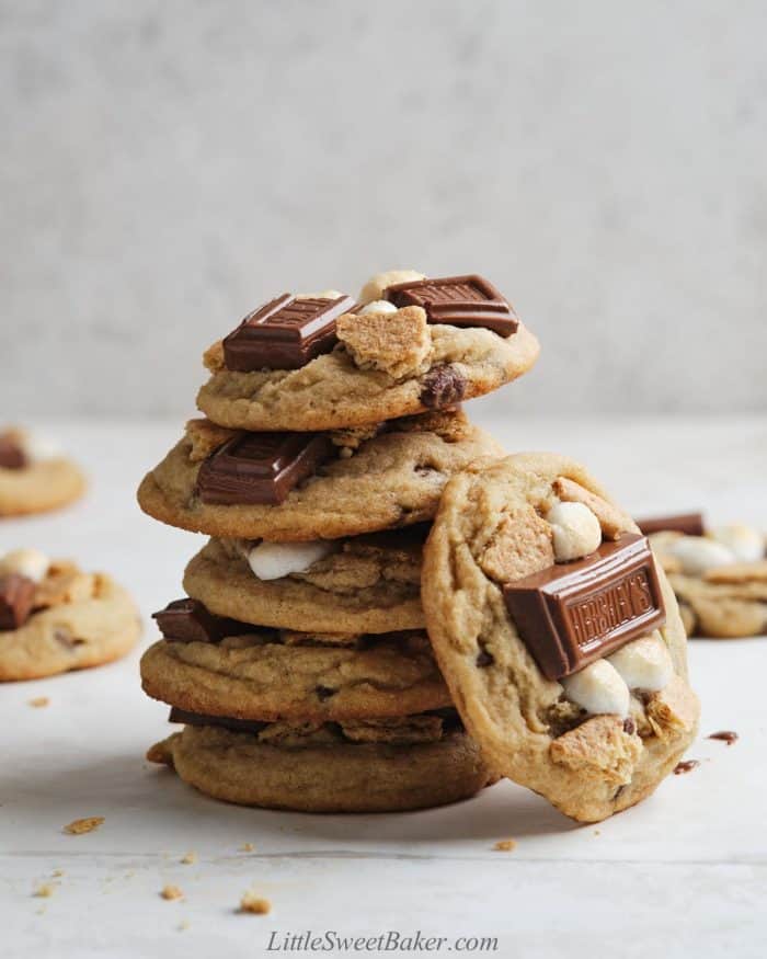 A stack of s'mores cookies with one on the side.
