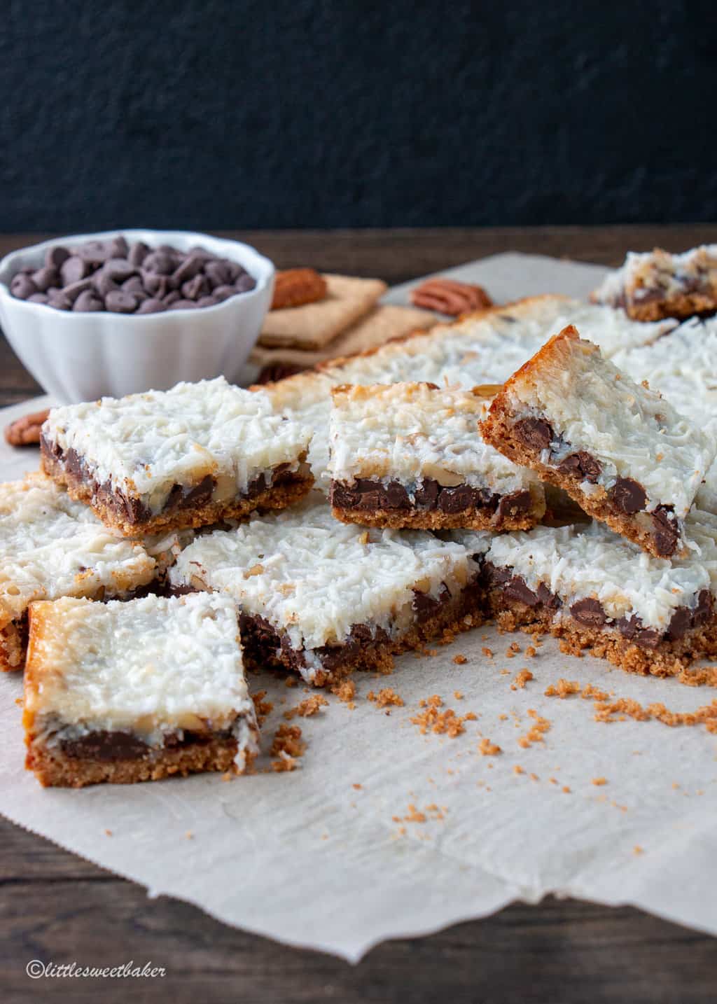 magic cookie bars on parchment paper