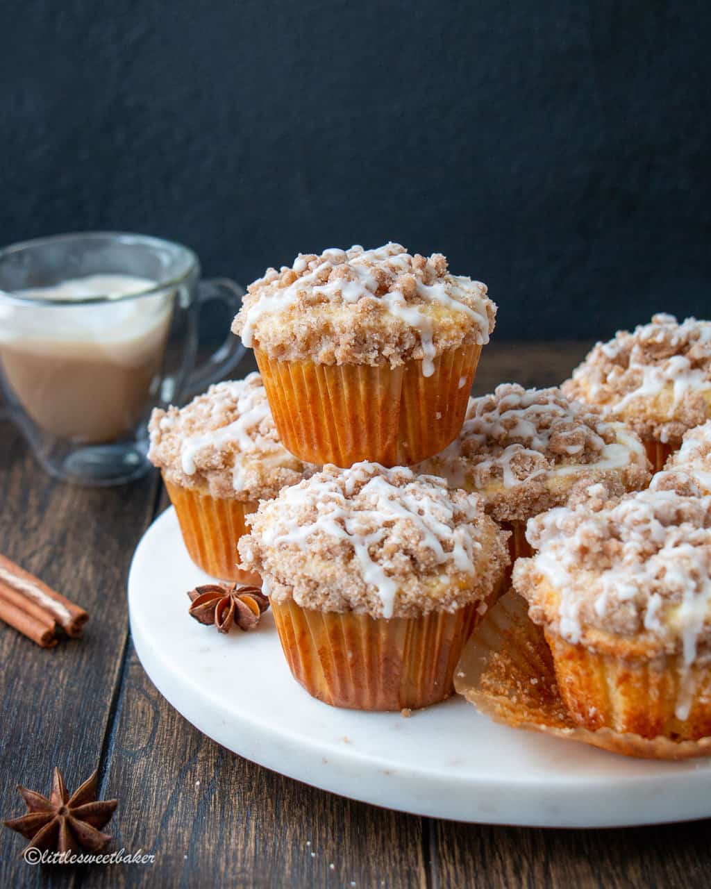 Coffee cake muffins on a white marble serving platter
