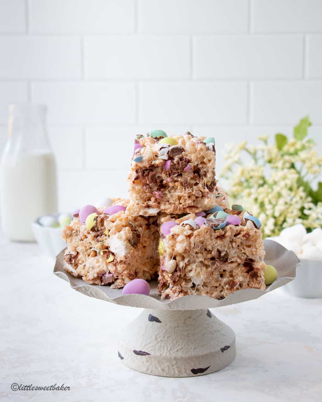 Easter Rice Krispie Treats stacked on a mini cake stand