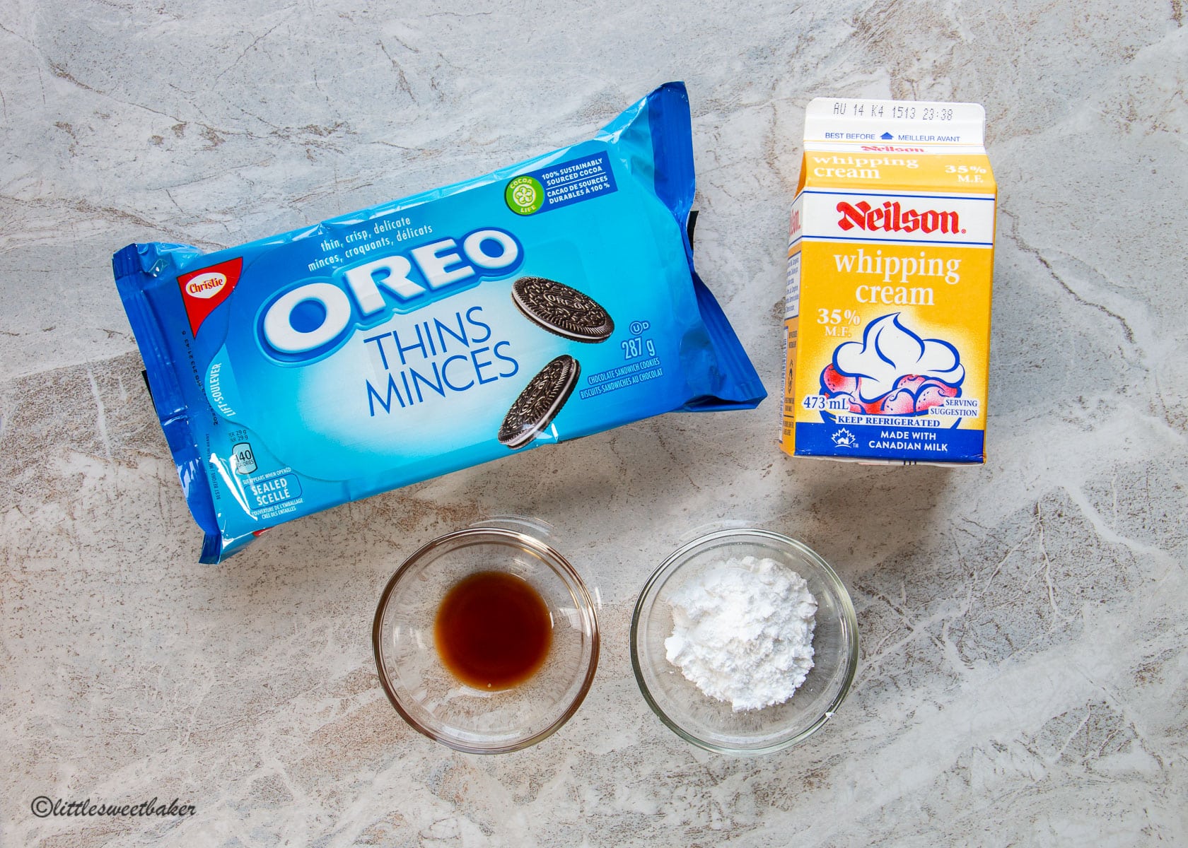 Ingredients to make icebox cake with Oreos instead of chocolate wafers.