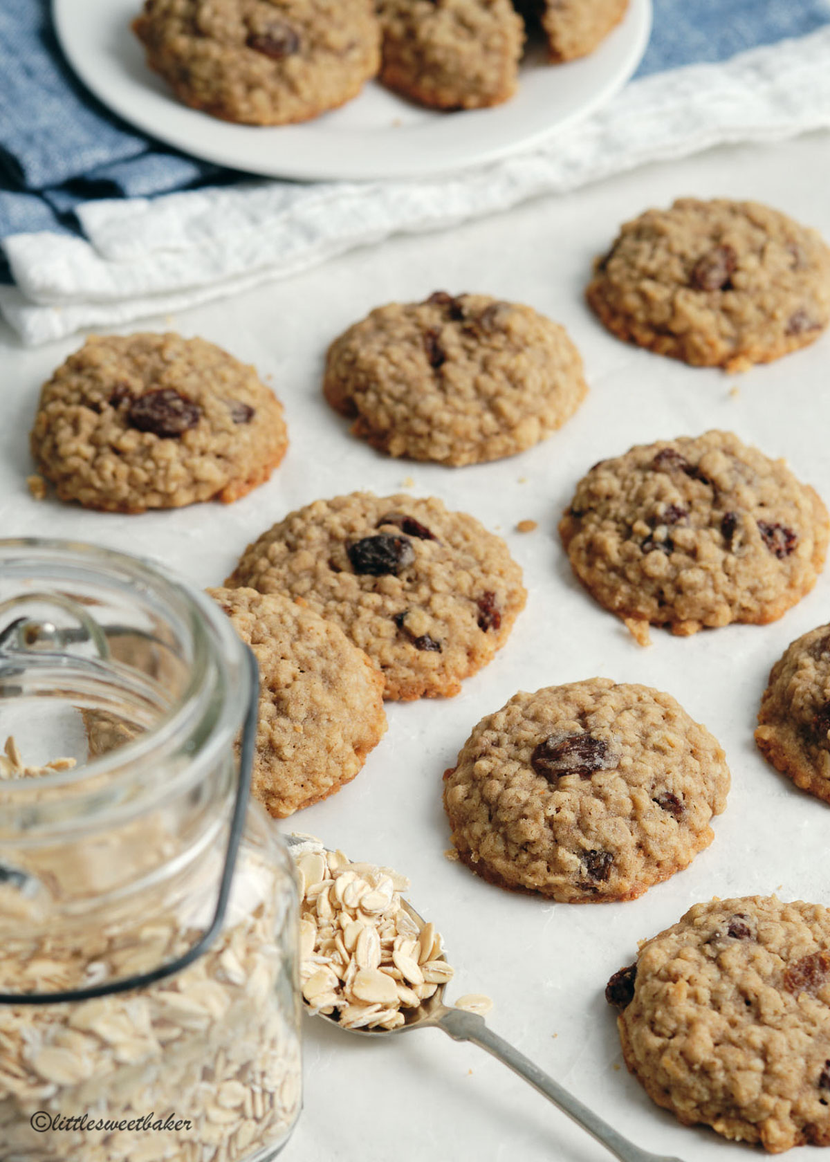 oatmeal raisin cookies on a sheet of parchment paper