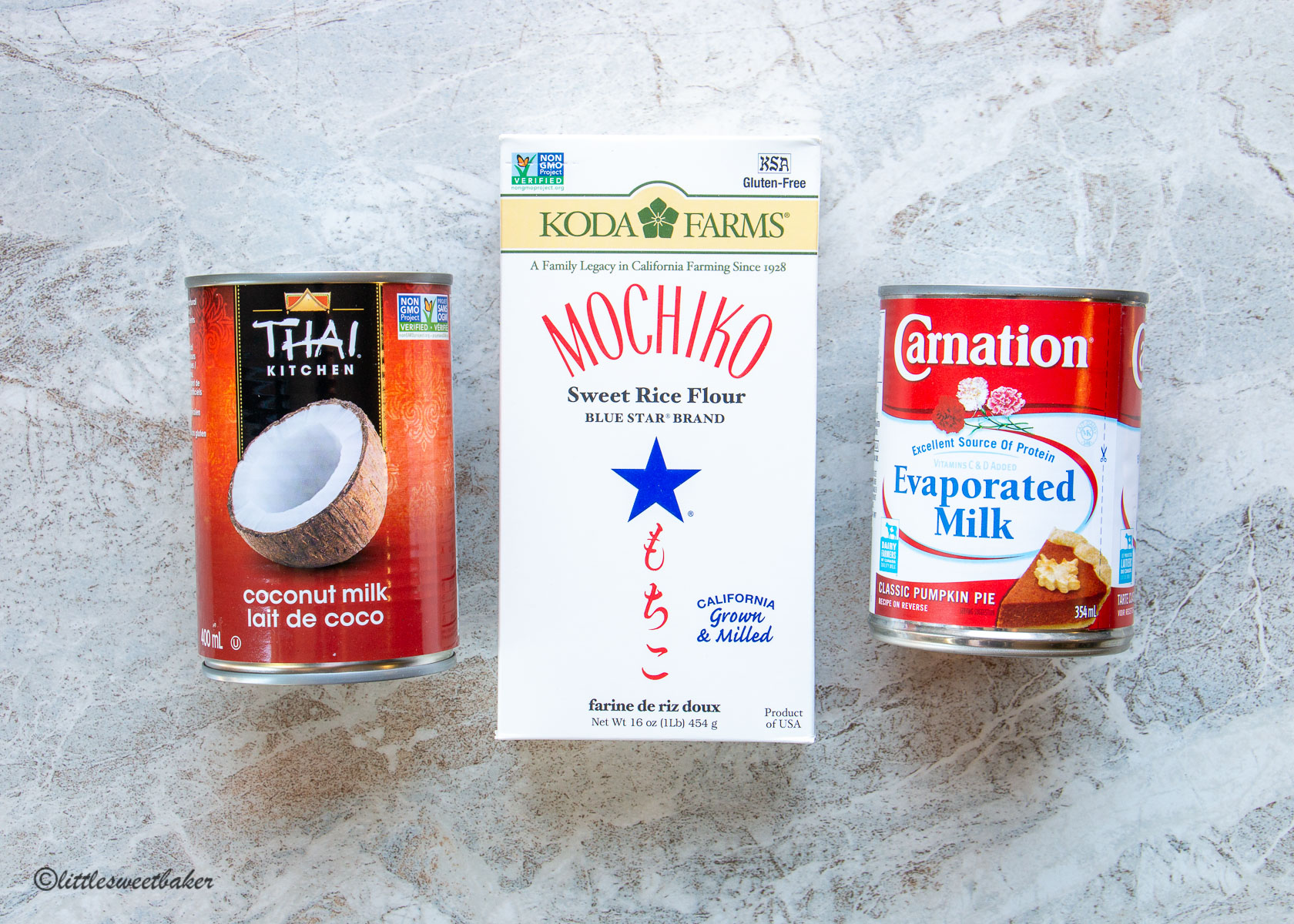 a can of coconut milk, box of Mochiko flour and can of evaporated milk