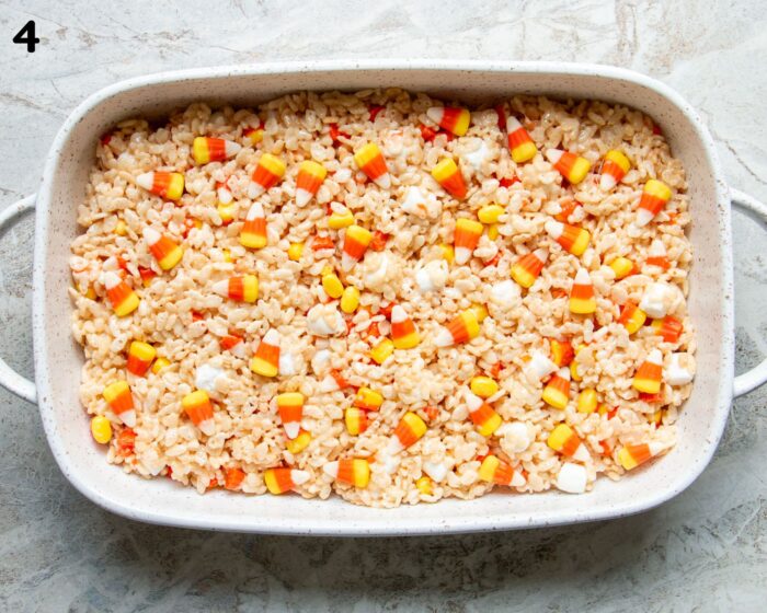 A casserole dish of candy corn rice krispies.