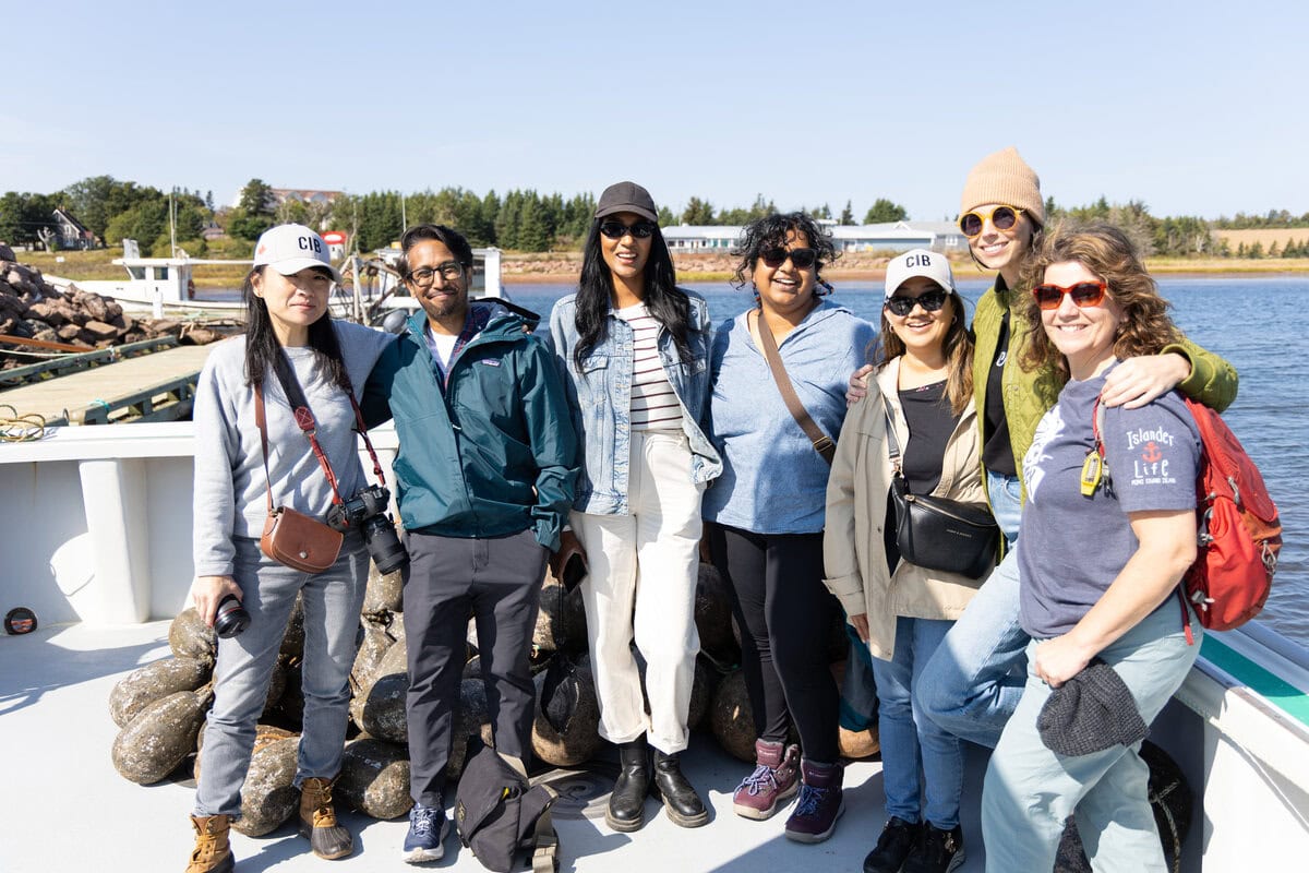 Food Bloggers of Cananda members on a mussel boat in PEI.