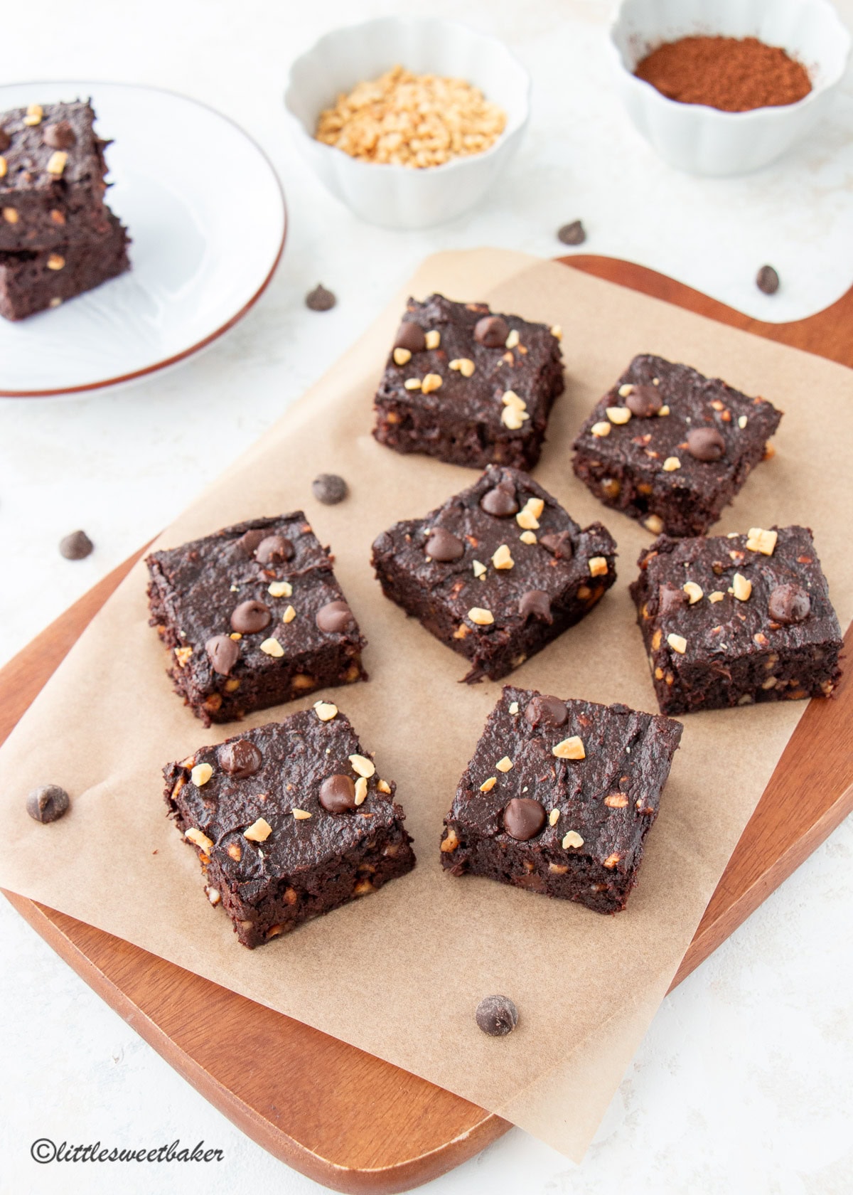 Healthy Sweet Potato Brownies on a wooden cutting board.