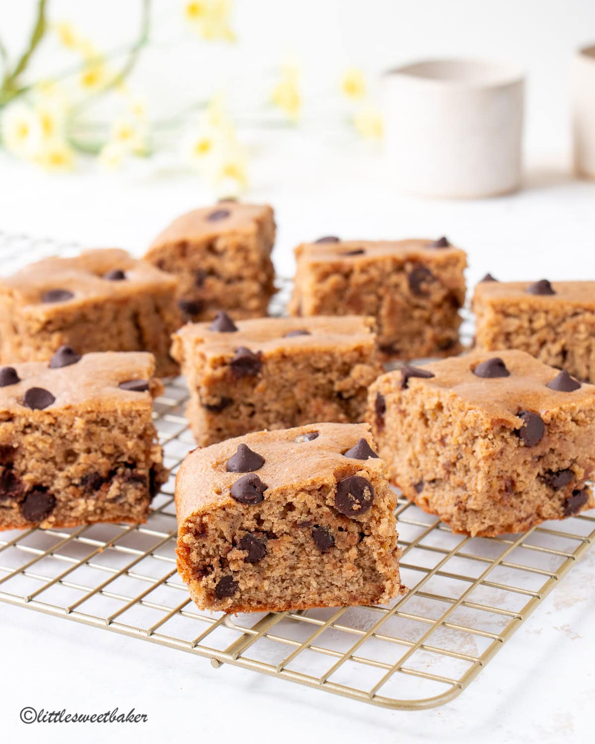 High-Protein Chocolate Chip Cake Bars on a cooling rack.