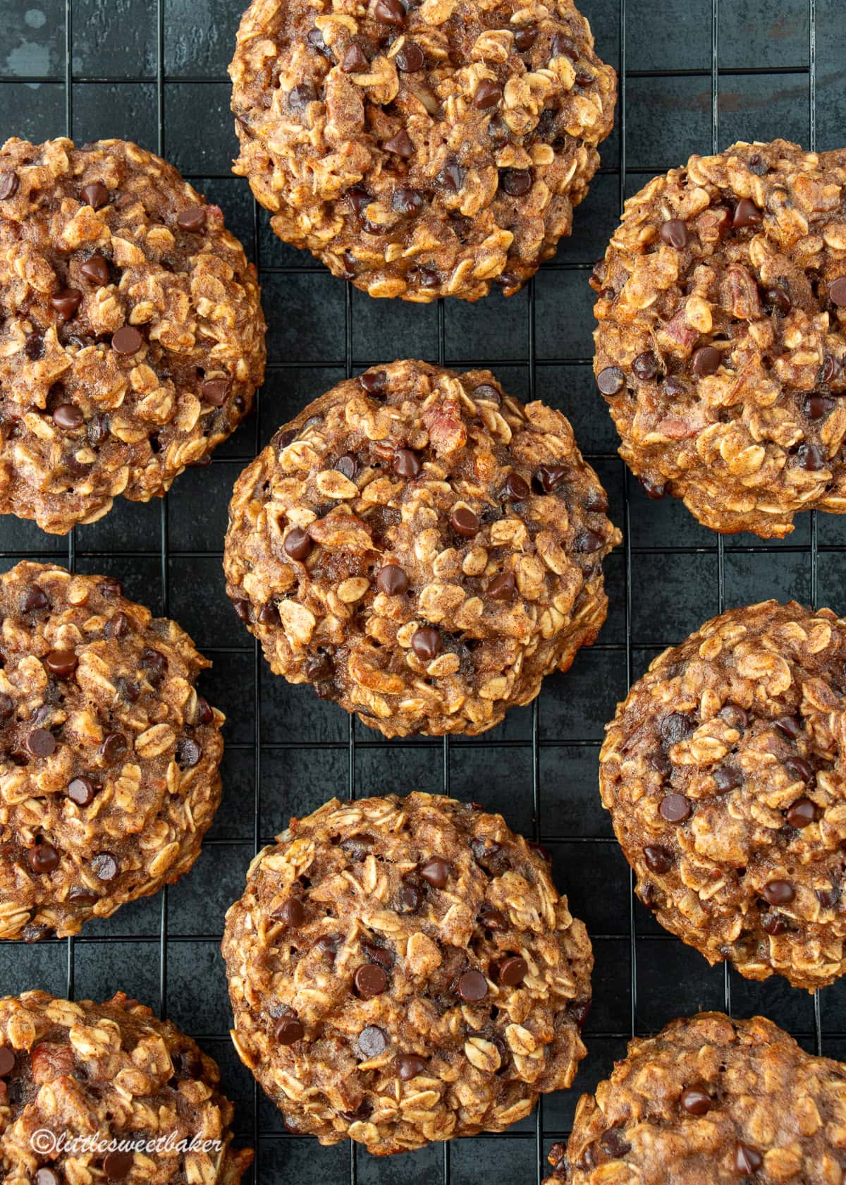 Healthy banana oatmeal cookies on a cooling rack.